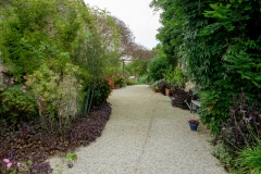 Clematis and wisteria clothe the walls